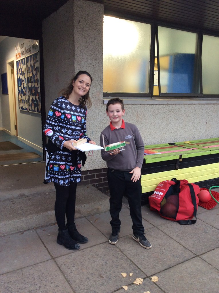 Tommy with his sleigh for Santa